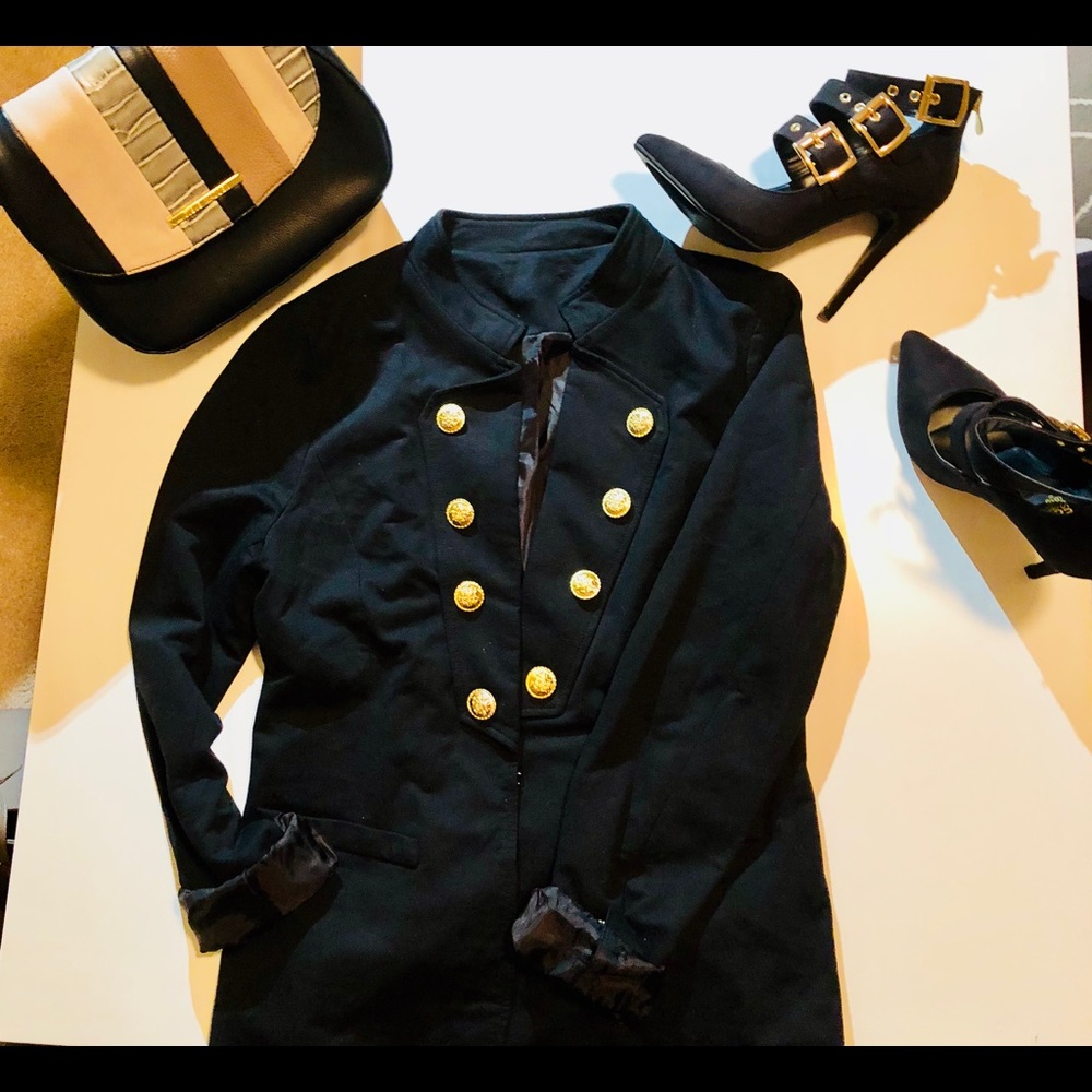 Super cute, light coat/blazer.
